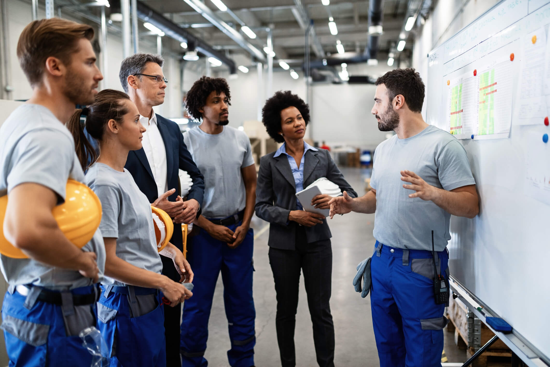 man talking to staff